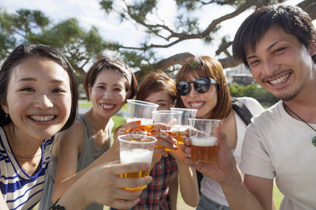 Group of friends in the park — Stock Photo
