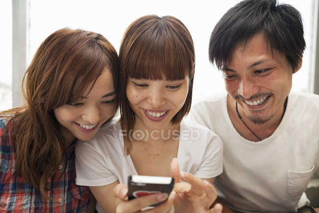 Japanese Friends together at home. — Stock Photo