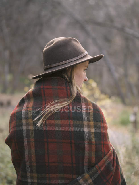 Young blond woman wearing a hat — Stock Photo