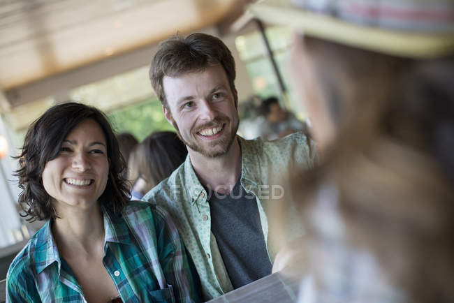 Man and woman at a diner — Stock Photo