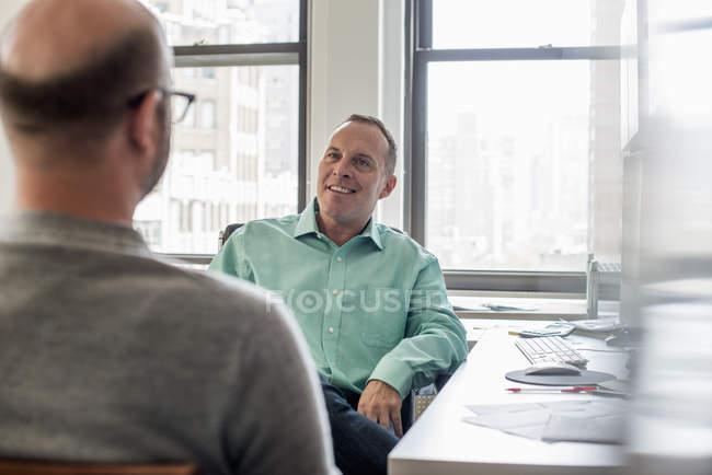Two business men talking — Stock Photo