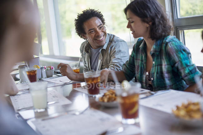 Friends eating at a diner — Stock Photo