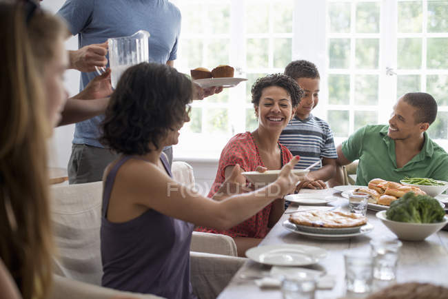 Family sharing a meal. — Stock Photo