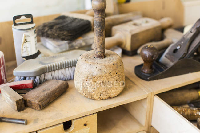 Large mallet, brushes and hand tools — Stock Photo