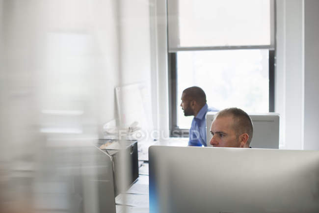 Two men working in an office — Stock Photo