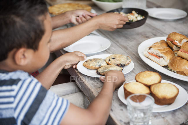 Family gathering for a meal. — Stock Photo