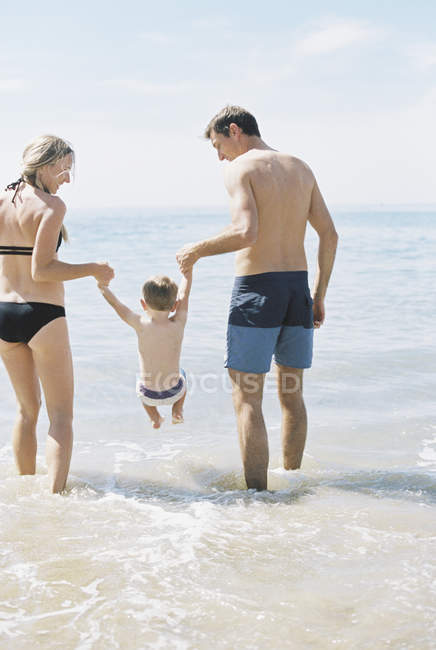 Couple playing with their son — Stock Photo