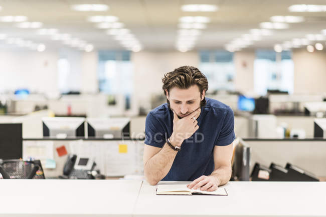 Man leaning on his elbow — Stock Photo