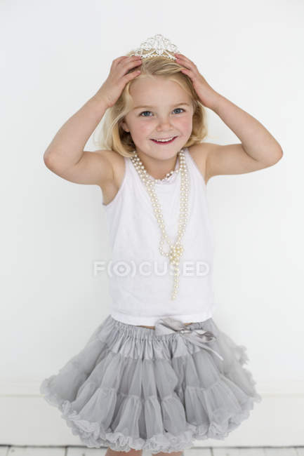 Young girl wearing a tiara — Stock Photo