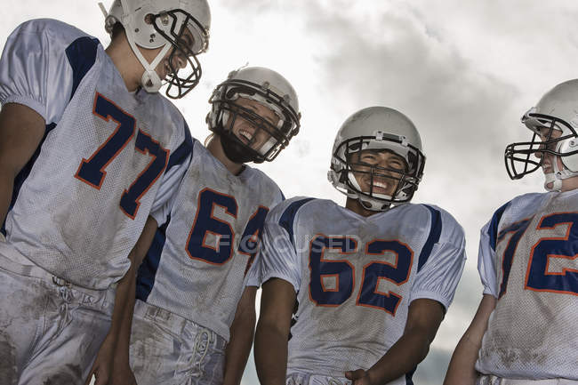 Football players in sports uniform — Stock Photo