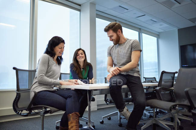 Three colleagues at a meeting — Stock Photo