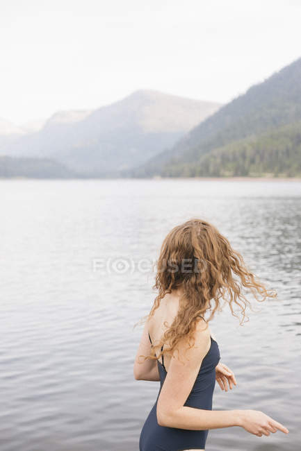 Woman in a black swimsuit — Stock Photo