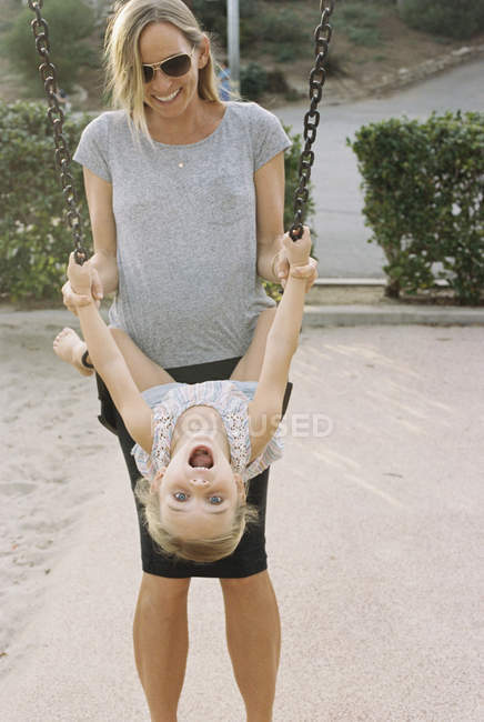 Woman playing with her daughter — Stock Photo