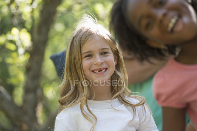 Group of children and adults — Stock Photo
