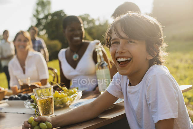 Picnic or buffet in the early evening. — Stock Photo