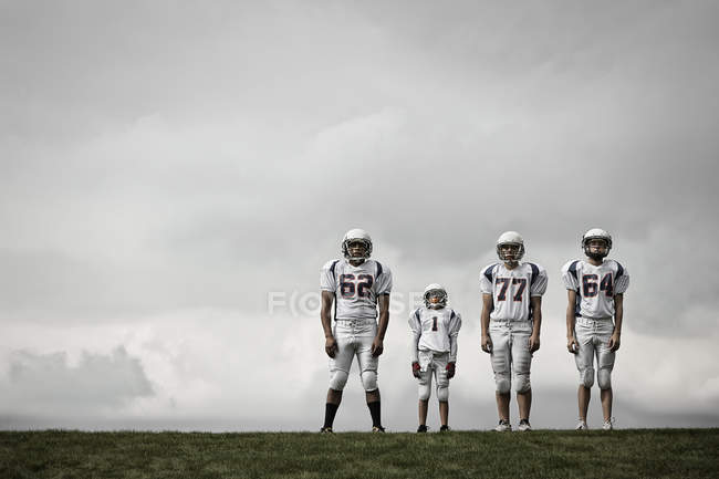 Jogadores de futebol em uniforme esportivo — Fotografia de Stock