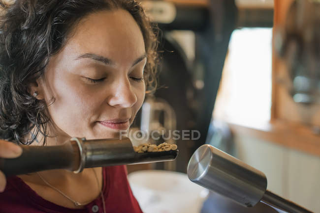 Person testing and smelling the aroma — Stock Photo