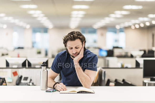Man leaning on  his elbow — Stock Photo