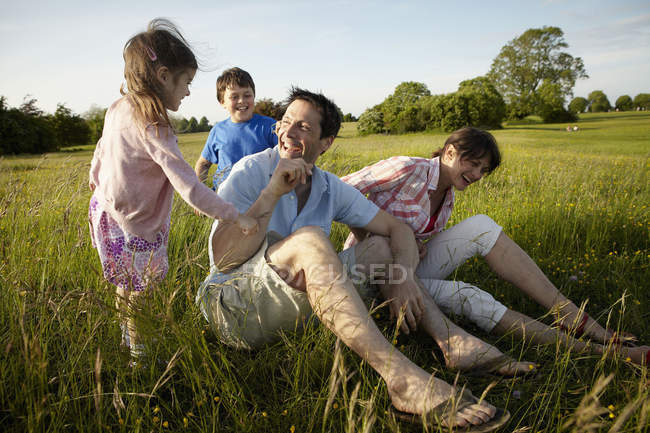 Family, two parents and two children — Stock Photo