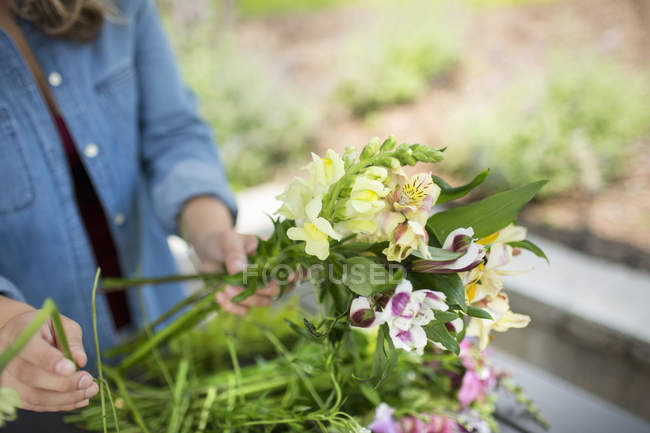 Woman holding a bunch — Stock Photo