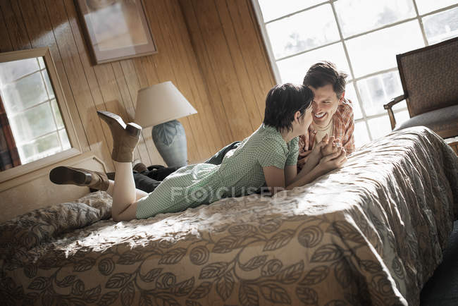 Couple in a motel room. — Stock Photo