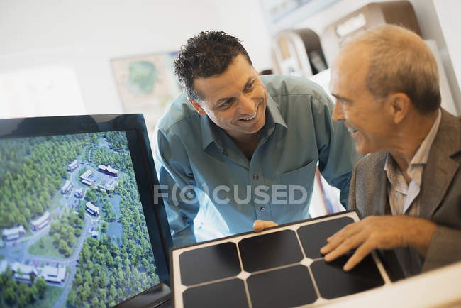 Architects working on a green construction project — Stock Photo
