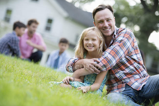 Father and daughter at a summer party — Stock Photo