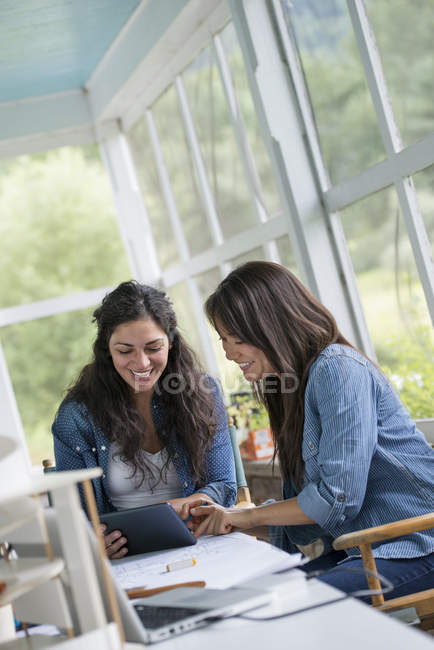 Two women working together — Stock Photo