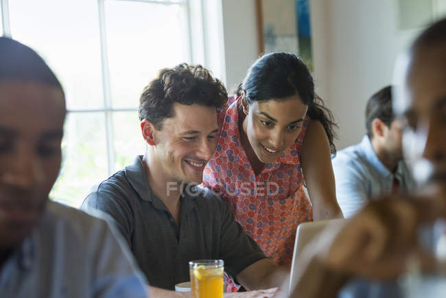 Men and women in cafe — Stock Photo