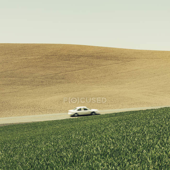 Car on uphill slope — Stock Photo