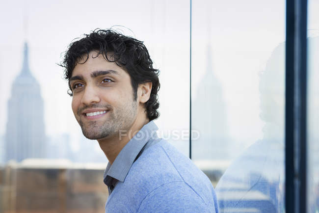 Man with black curly hair — Stock Photo