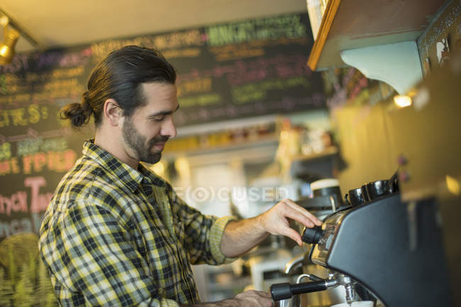 Man making coffee. — Stock Photo