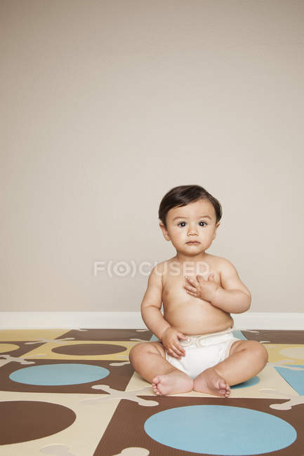 Baby boy wearing cloth diapers. — Stock Photo