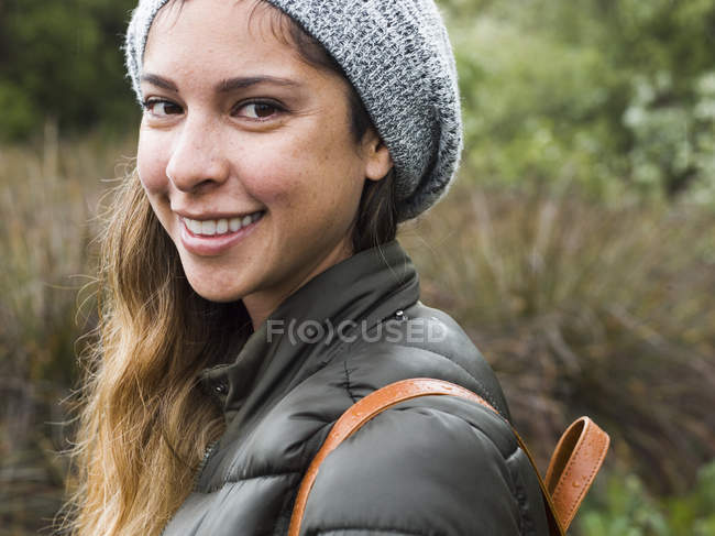 Young woman in a park. — Stock Photo