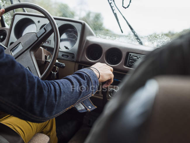Young man in a car — Stock Photo