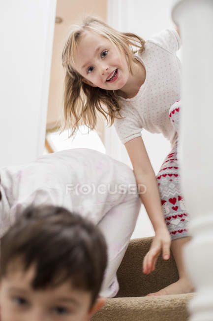 Children playing on the stairs. — Stock Photo