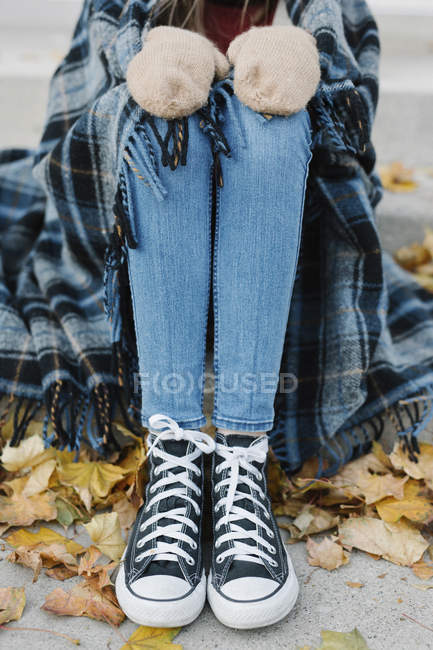 Person sitting on a step — Stock Photo