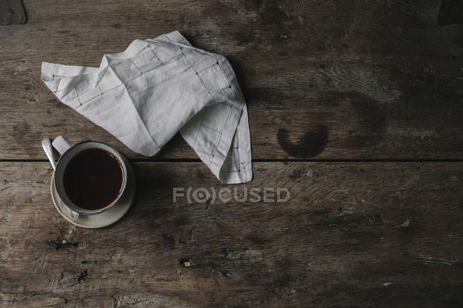 Cup of coffee and napkin — Stock Photo