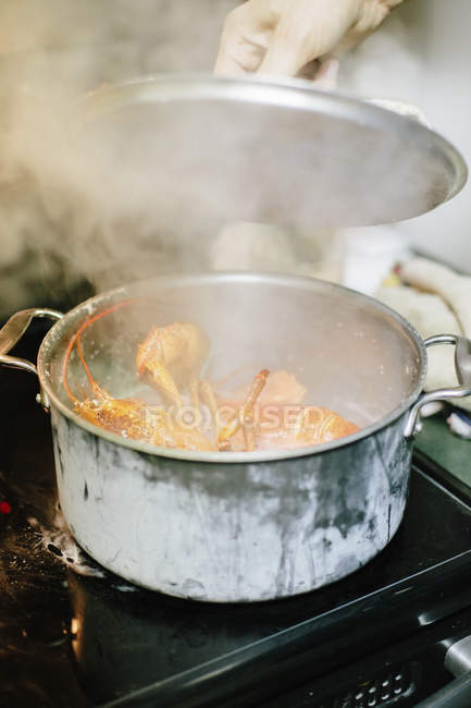 Chief cooking lobster — Stock Photo