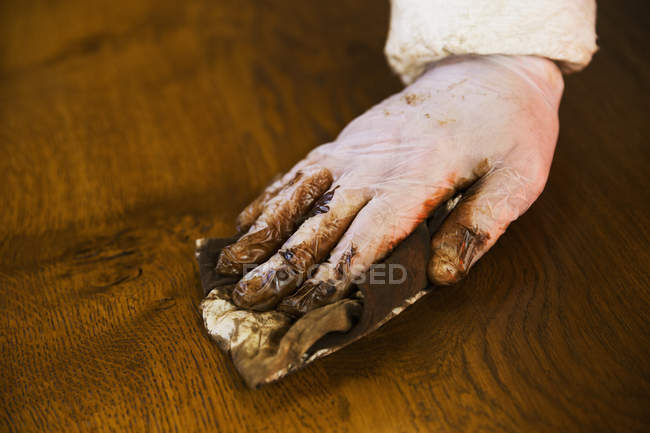 Arpenter wearing protective gloves — Stock Photo