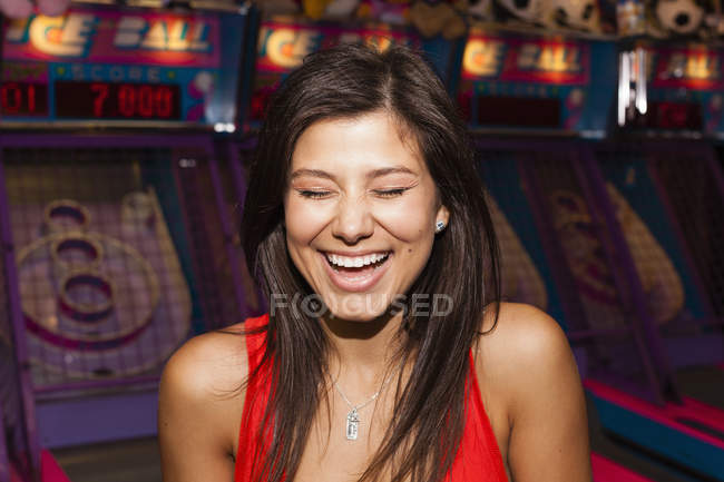 Woman in front of slot machines — Stock Photo