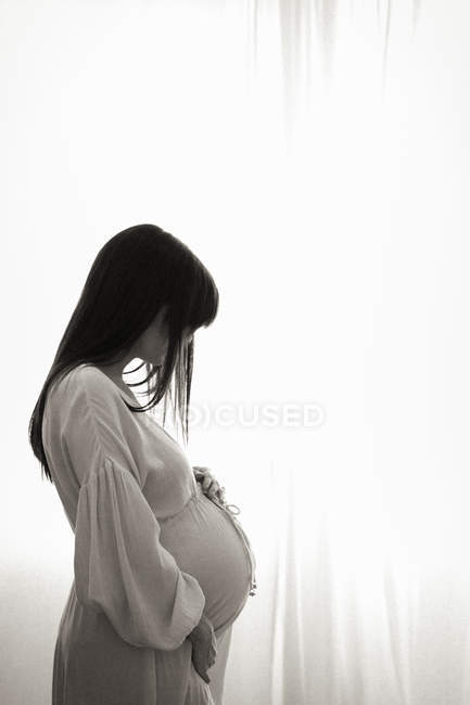 Heavily pregnant woman — Stock Photo