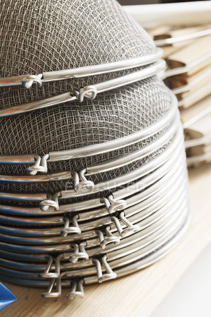 Stack of metal sieves. — Stock Photo