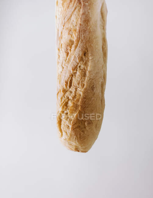 Organic baked sourdough baguette — Stock Photo