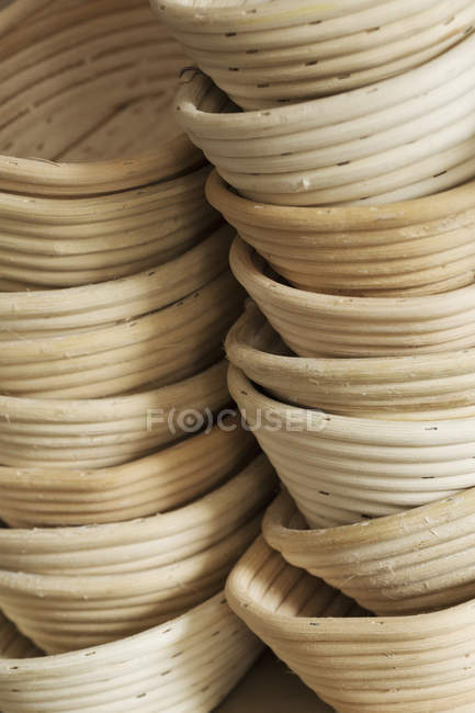 Stack of rattan proofing baskets. — Stock Photo
