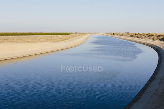 Irrigation of drought-ridden agricultural area — Stock Photo
