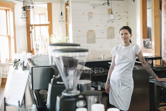 Woman in a coffee shop — Stock Photo