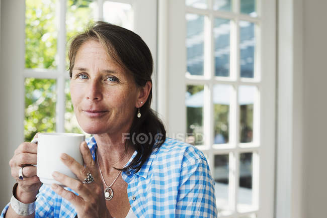 Woman drinking a tea — Stock Photo