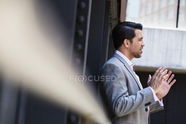 Businessman talking and gesturing with hands — Stock Photo