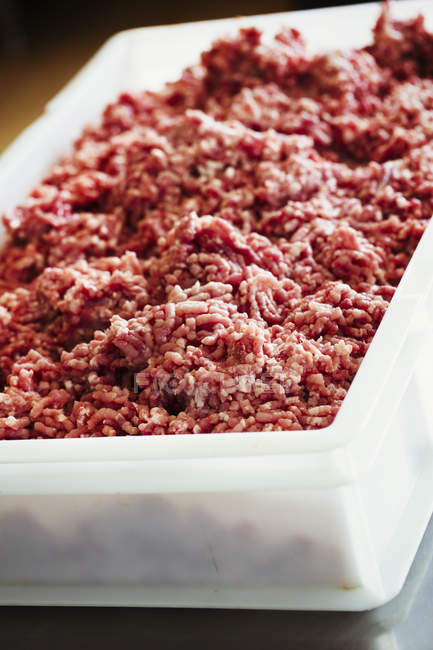 Tray of freshly ground meat — Stock Photo